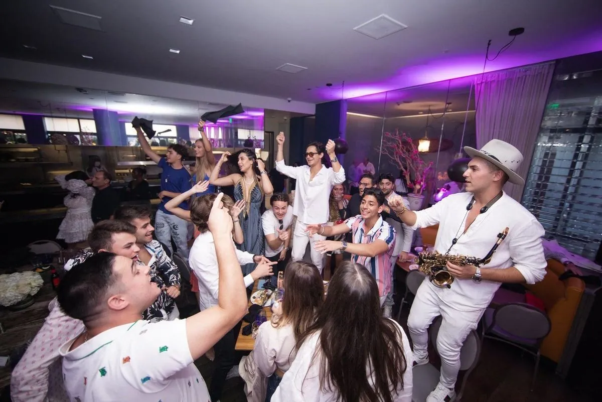Live saxophone among guests at a private party in Southern California